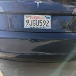 Tesla blue model 3 rear bumper dent repair