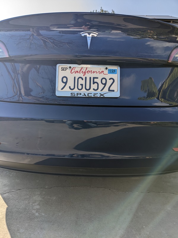 Tesla blue model 3 rear bumper dent repair