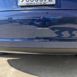 Tesla Blue model 3 rear bumper dent