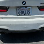 BMW M3 rear bumper dent