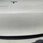 Tesla model 3 bumper crease dent repaired