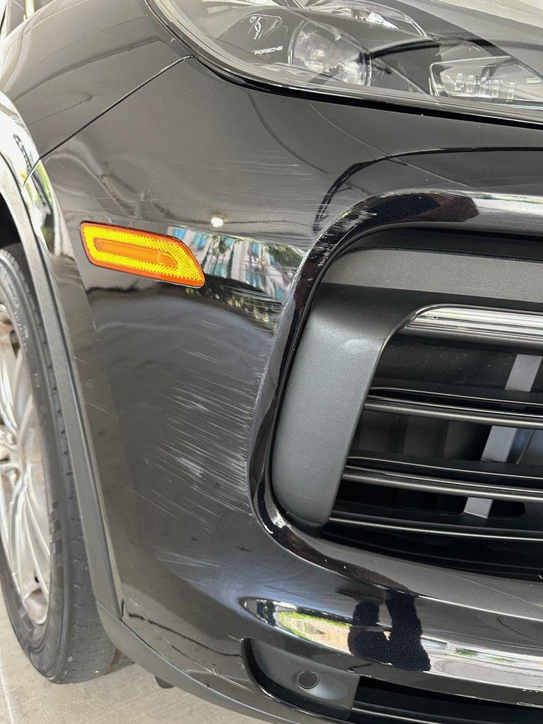 Porsche Cayenne bumper scratched