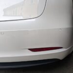 Tesla pearl white rear bumper repainted