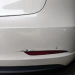 Tesla rear bumper damage