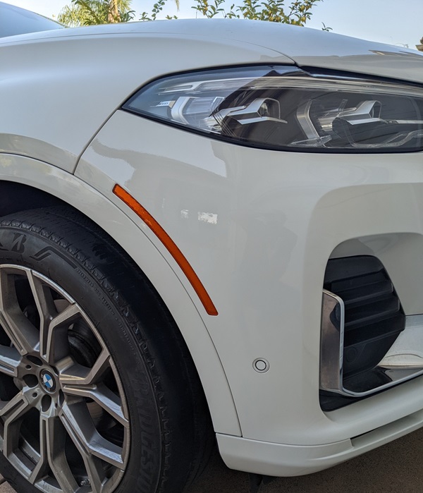 BMW alpine white bumper repainted